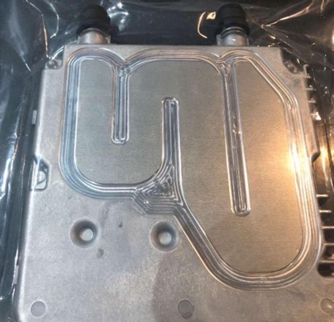 Integrated closed cooler with brazed channels