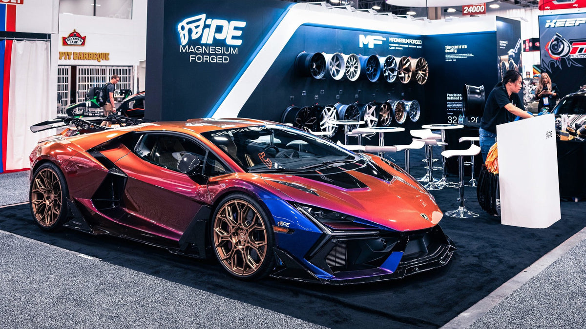 iPE booth at SEMA Show, Las Vegas, with Lamborghini Revuelto