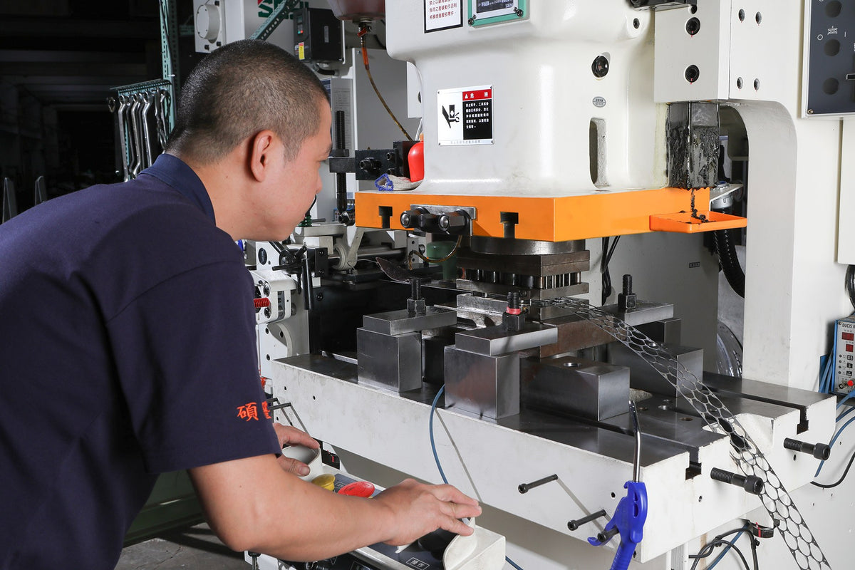 Precision punch press operation at Shou Long